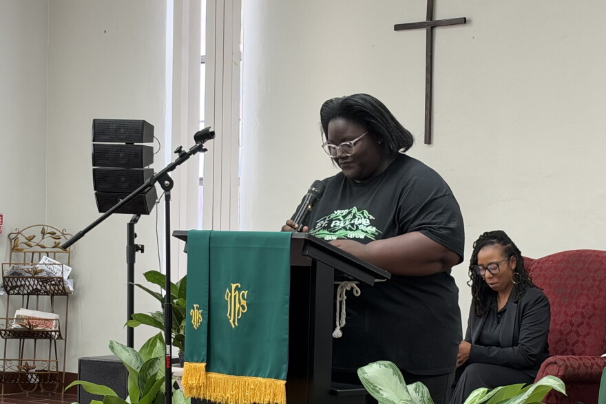 Ayanna Gaskin, 15, leads a prayer during a recent Sunday morning service at the church.