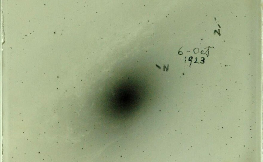 This glass side of a photographic plate shows where Hubble marked novas. The red VAR! in the upper right corner marks his discovery of the first Cepheid variable star — a star that told him the Andromeda galaxy isn't part of our Milky Way.