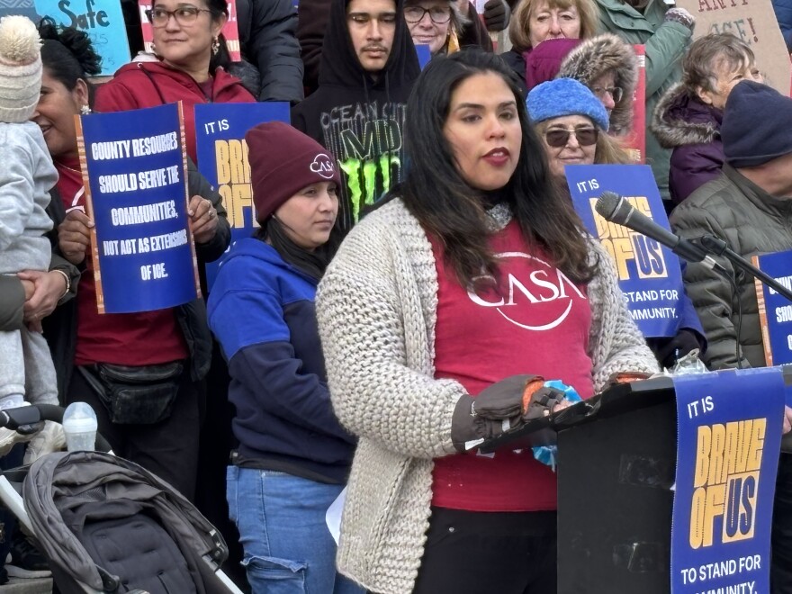 Jossie Flor Sapunar, national communications director for CASA, speaks at a rally in Towson, Jan. 13, 2026.