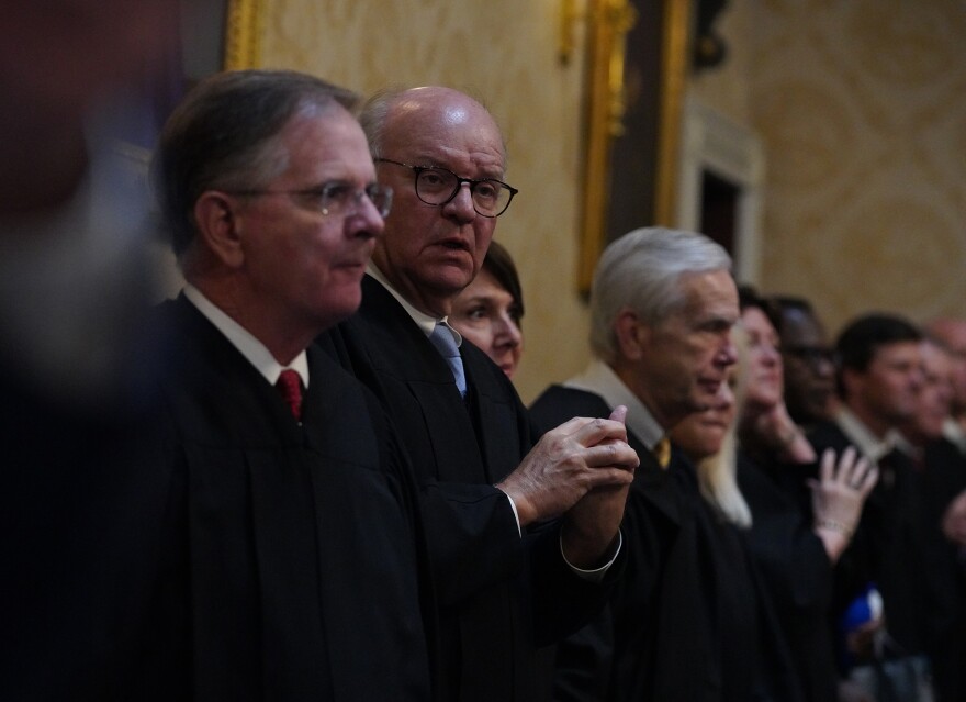 S.C. Supreme Court Justices George James and Gary Hill during a joint assembly for the annual State of the Judiciary address in the House chamber at the Statehouse on April 15, 2026.