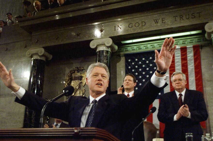 President Bill Clinton accepts the applause of members of Congress at his 1999 State of the Union address.