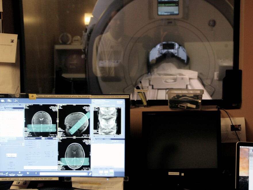 One of the study participants undergoes an MRI scan, to help researchers figure out which parts of the brain's facial recognition system change with age.