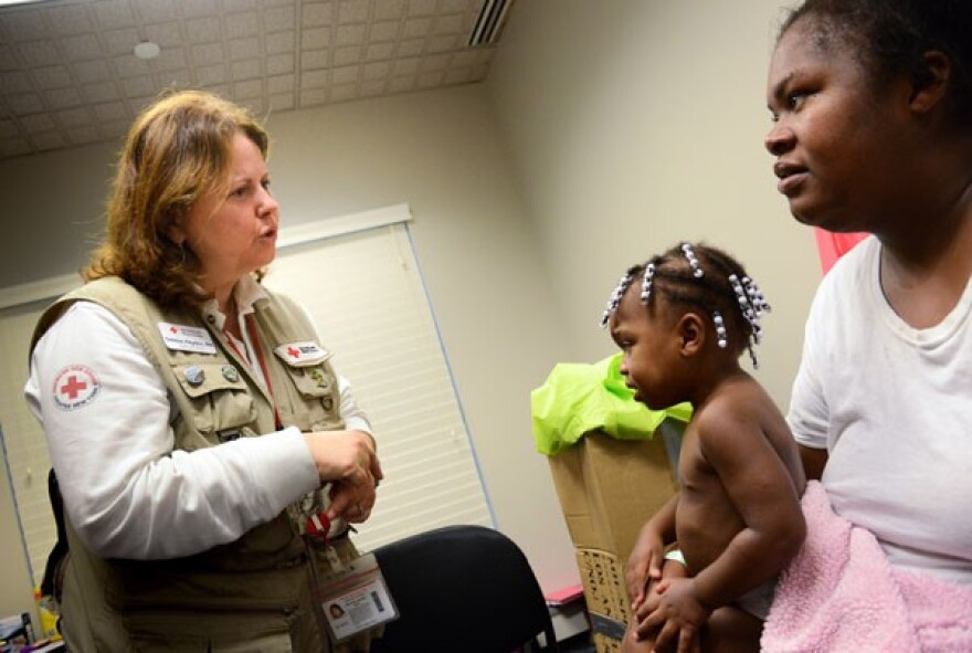 Health Services Lead Debbie Hayden, RN consults with mother Jaquana regarding care for her one-year-old Aliyah Rogers, while at the University of North Carolina at Chapel Hill Friday Center on September 17, 2018. 