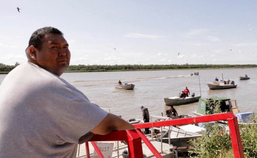 Commerical fisherman and Kwik'Pak store clerk Kenneth Lee gassing up boats in Emmonak, Alaska on July 15, 2019.