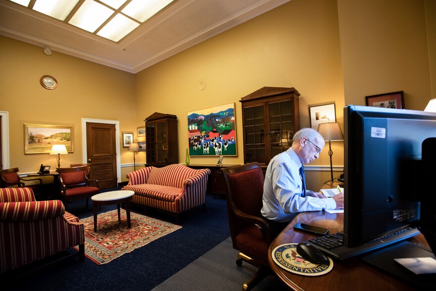 Congressman Peter Welch prepares for a floor speech.