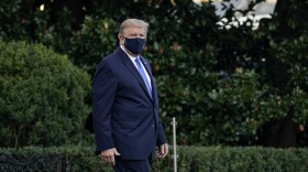 President Trump leaves the White House for Walter Reed National Military Medical Center on Friday. On Saturday night he said in a video that he was feeling better as he continues to receive treatment for the coronavirus.
