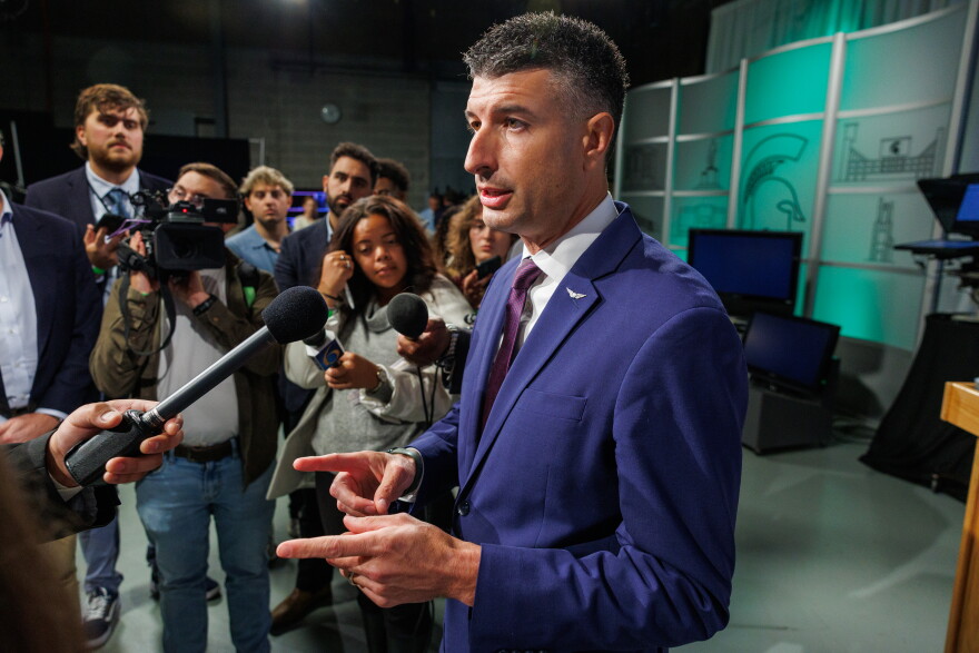 U.S. Rep. Tom Barrett, R-Charlotte, speaks to reporters at WKAR's studios in East Lansing, Mich., after the first head-to-head debate with Democratic nominee for U.S. House William Lawrence on Oct. 6, 2026.