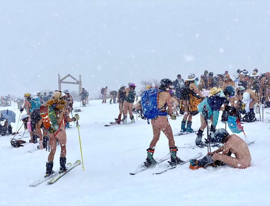 A large group of women get ready to send it for the naked ski lap down Sunlight Mountain at this year’s annual Boot Tan Fest on March 29, 2024. The very first festival had about 27 women in attendance, and this year, organizers estimate there were about 800 women.