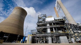 American Electric Power's Mountaineer coal power plant, with carbon capture unit (center right), alongside the plant's cooling tower and stacks, in New Haven, W.Va. (Saul Loeb/AFP/Getty Images)