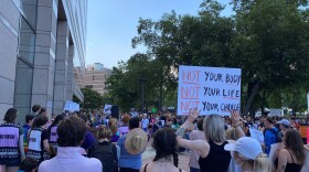 Abortion rights supporters gather in front of the Charlotte-Mecklenburg Government Center on June 24, 2022.