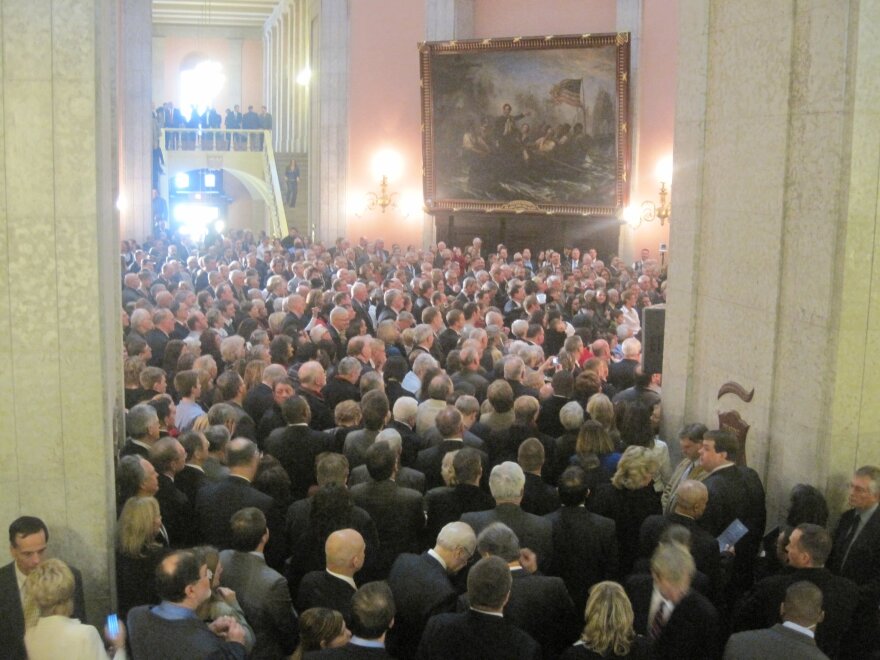 Hundreds of people packed Mike DeWine's first inauguration as Attorney General in the Statehouse Rotunda in January 2011.