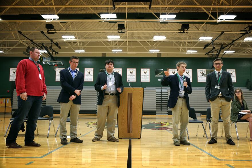 Six Kansas teens are running for governor, following the lead of Jack Bergeson (center). Some of the candidates are seen here participating in a forum at a high school in Lawrence, Kan., in October.