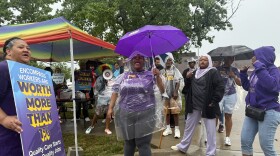 SEIU union members and Encompass Health Group employees picketed outside of Encompass's Wornall clinic Monday. They're calling for better wages for existing employees.