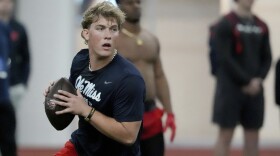 Mississippi quarterback Jaxson Dart sets up to pass during an offensive passing drill at the school's NFL football pro day, Friday, March 28, 2025, in Oxford, Miss.