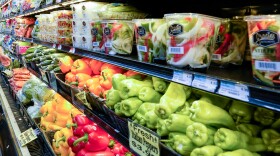  Produce on shelves in a grocery store