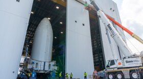 Blue Origin installs new doors at its launch facility that was damaged by an explosion in May. Photo