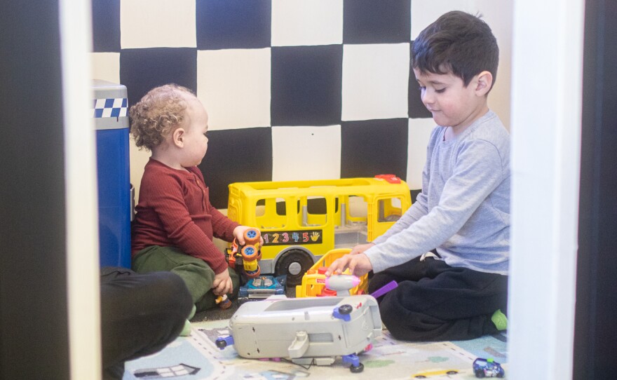 Kamari Adams and Jacob Núñez play with toy cars on Feb. 26. Parents must sign a waiver for their kids to play.