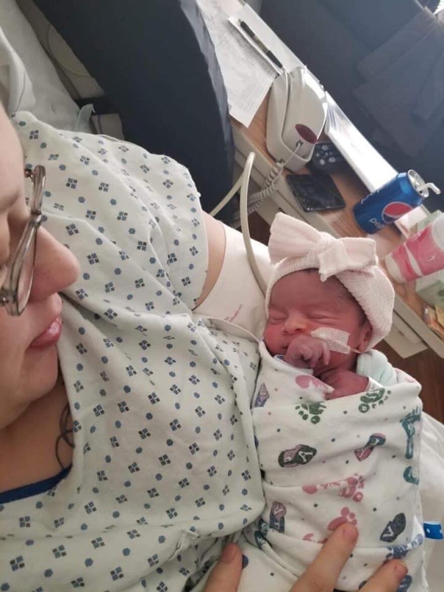 Fannon with her newborn daughter