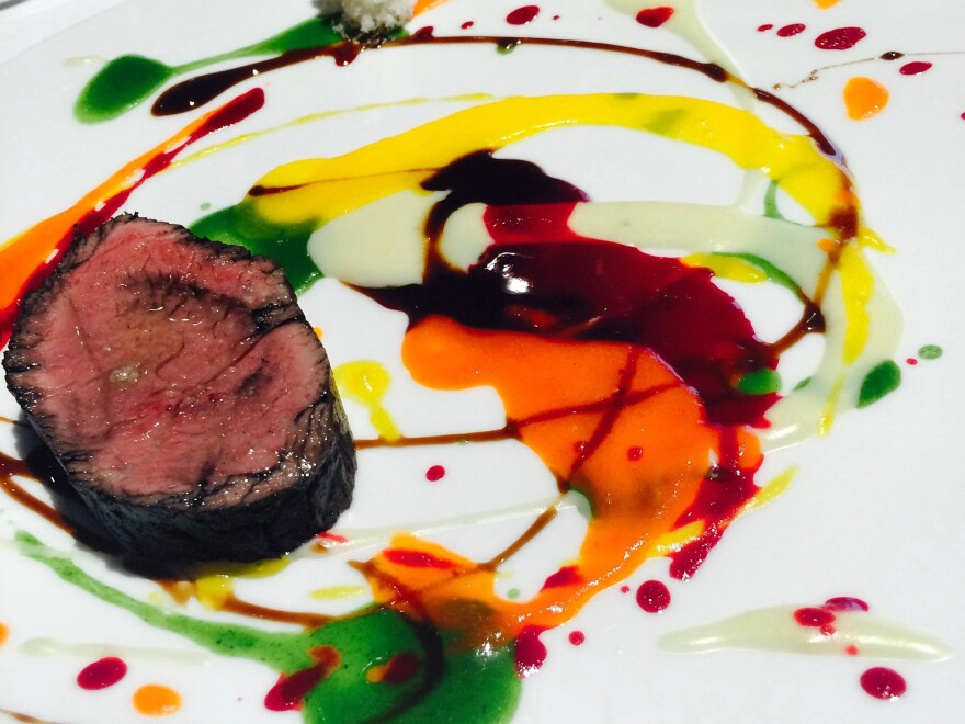 An artfully plated dish with tricolor sauces is served at Osteria Francescana, Chef Massimo Bottura's three-Michelin-star restaurant in Modena, Italy, which topped last year's list of the World's 50 Best Restaurants.