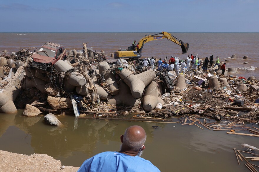 Rescue personnel work in the aftermath of deadly floods in Derna, Sept. 16.