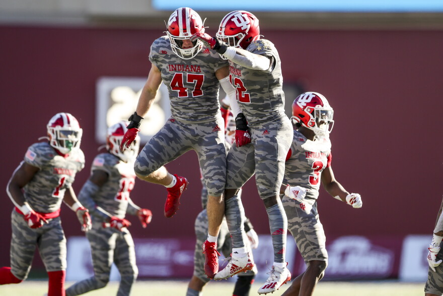 Indiana's Micah McFadden (47) and Jamar Johnson celebrate an interception by McFadden against Maryland Nov. 28 at Memorial Stadium.