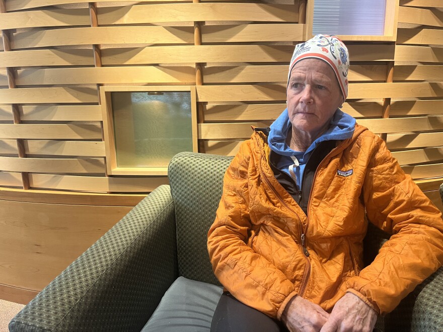 Cancer patient Elizabeth Arnold sits in the waiting room of the chemotherapy treatment room in Providence Alaska, Anchorage. The center that treats her is struggling with a shortage of one of her drugs: carboplatin. (Rachel Cassandra/Alaska Public Media)