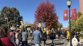 UMass Amherst union members rally on campus demanding fair wages.