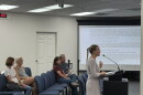 Lauren Rushing, the consultant NUE project manager and principal planner, speaks to the Lake City Council during Thursday's first hearing of her company's mobility plan. (Ethan Pettus/WUFT N