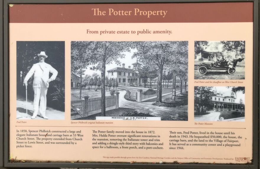 A plaque detailing the history of the Potter House stands out front of the residence.