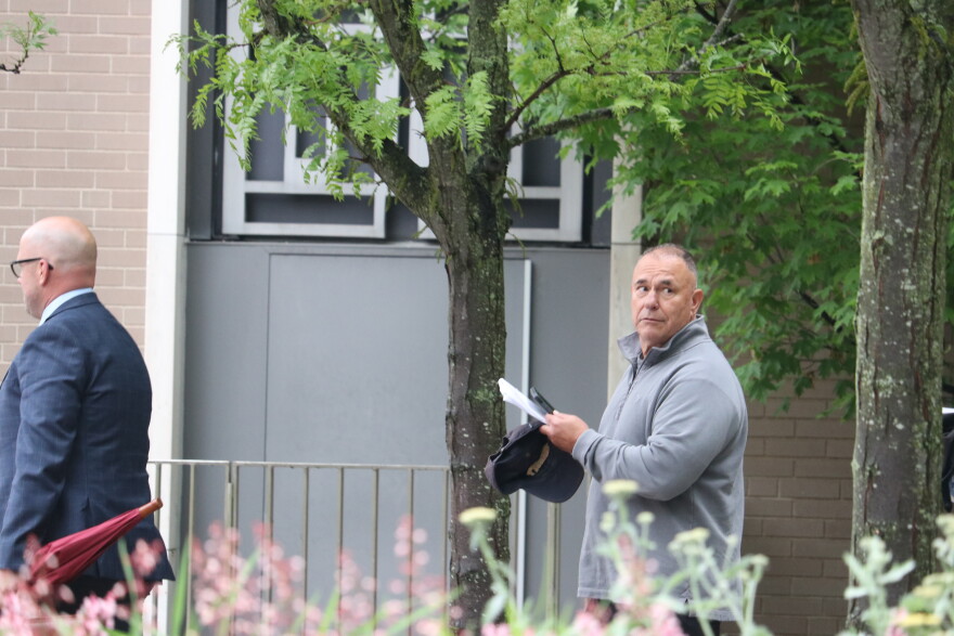 Konstantinos “Kosta” Diamantis leaves federal court with his lawyer in Hartford on May 16.