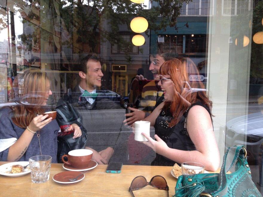 Left to right: Hannah Apple Fig, Trent Johnson, Matt Streib and Jessica Bernard at Stumptown Coffee Roasters on Pine Street. Matt found the defectors: all three are or were baristas at Starbucks, and while Matt is on coffee number four, Jessica imbibes at