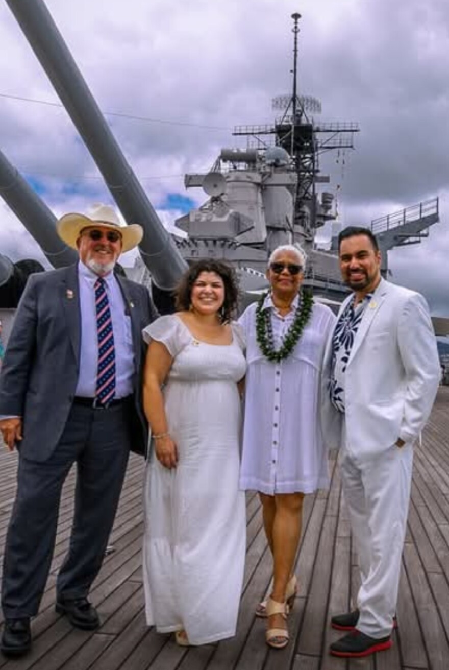 Jax legislators Manny Abarca and Venessa Huskey pose on the battleship USS Missouri