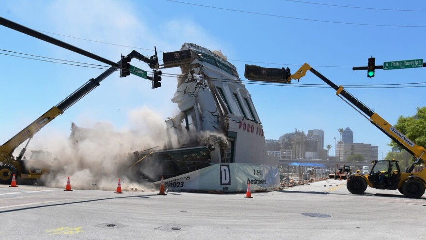 The final corner of the 1914 Doro Fixture Co. building complex came down in a shower of bricks Thursday afternoon.