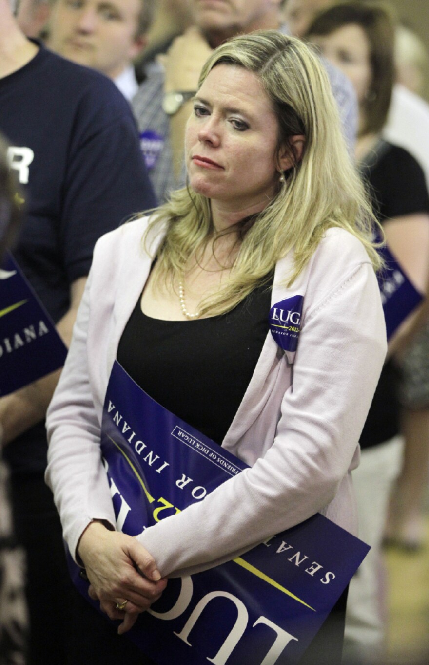 A supporter of Sen. Richard Lugar listens to his concession speech Tuesday in Indianapolis.