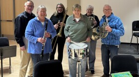 The members of the "7th Grade Band" text group and their director pose after a recent Act 2 band rehearsal at the Traverse City Philharmonic Center L to R: Pete Deneen, Marlene Robinson, Nancy Giffels, Jennifer Wesling, Jean Callum, Tom Wright