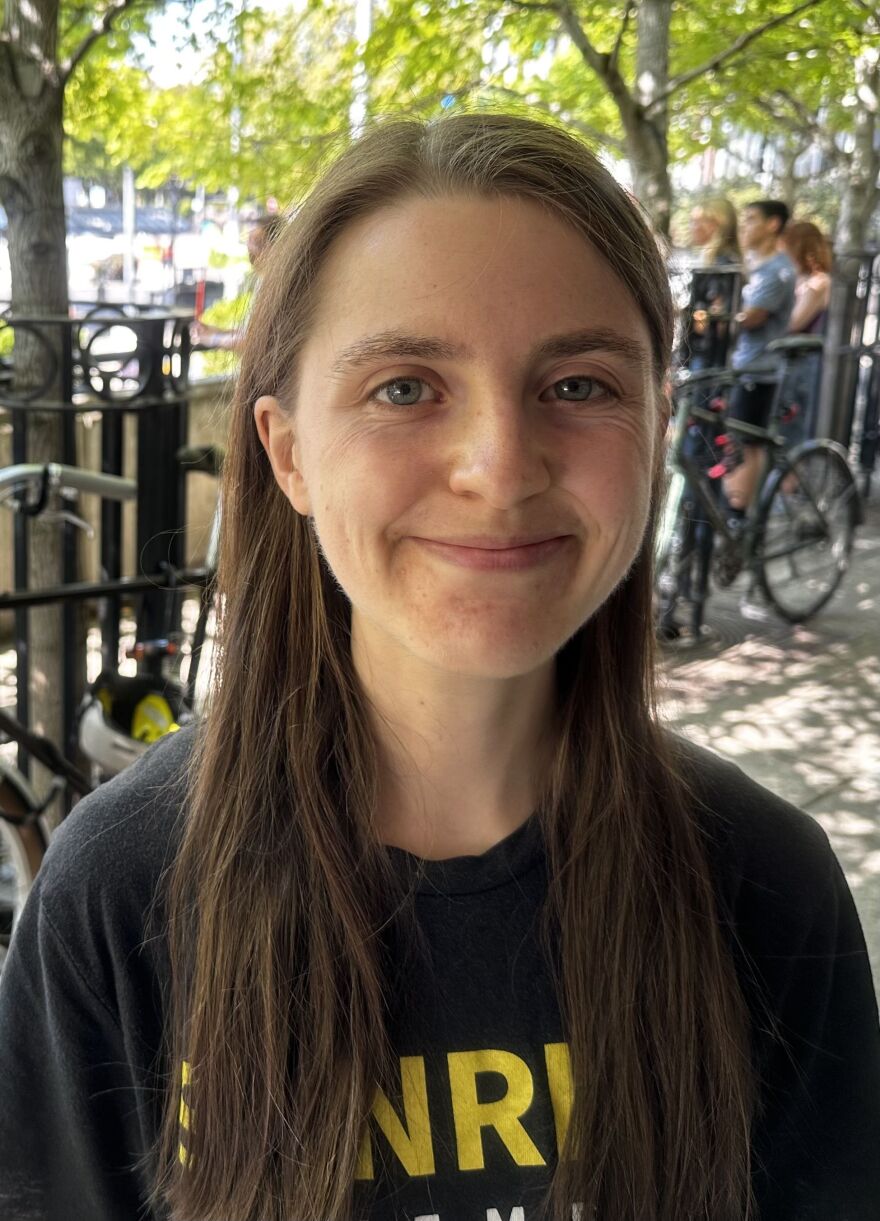 Woman smiling.