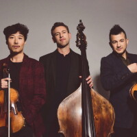 The members of Time for Three. From left to right: violinist Charles Yang, bassist Ranaan Meyer, and violinist Nick Kendall.