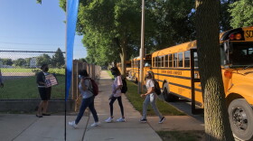 Students arrive at MacDowell Montessori on Aug. 16, the first day of school for MPS early-start schools.