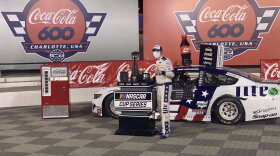 Brad Keselowski poses after winning the Coca-Cola 600 at the Charlotte Motor Speedway on Monday.