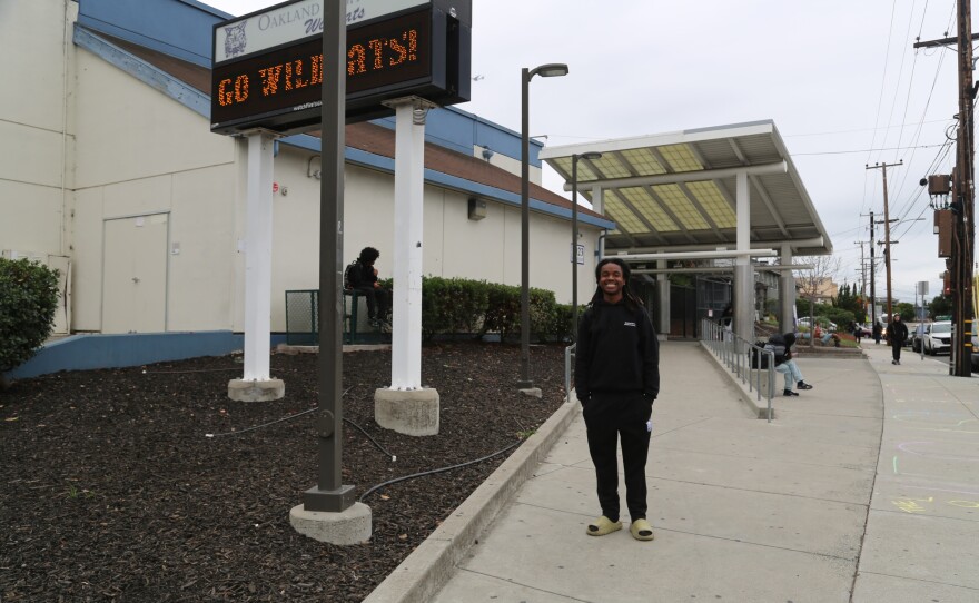 Maximus Simmons outside Oakland High School.