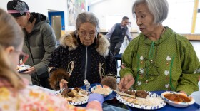 Volunteers serve Elders first at the 2025 Cama'i Dance Festival Native Foods Dinner at Bethel Regional High School on March 29, 2025.