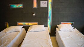 Beds for patients awaiting examination that are not suspected of being Covid-19 positive stand inside a converted chapel area at Martin Luther King Jr. (MLK) Community Hospital in the Willowbrook neighborhood of Los Angeles, California.