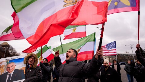 A member of the Iranian community shouts during a rally in support of anti-government protests in Iran, in Bucharest, Romania, Sunday, Feb. 1, 2026.