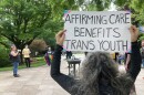 Demonstrators outside the Ohio Statehouse showing support for transgender kids as a House committee hears a Republican backed bill to ban gender affirming treatments for minors under 18.