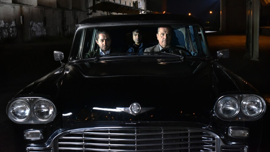 L to R: Khaled (Sherwan Haji), Mazdak (Simon Al-Bazoon) and Waldemar (Sakari Kuosmanen) in <em>The Other Side of Hope</em>.