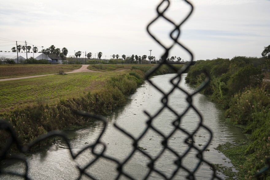 Temporary immigration court facilities (left) have been erected on the U.S. side of the Rio Grande. The Trump Administration is using them to speed up the adjudication of asylum applicants waiting in Mexico.