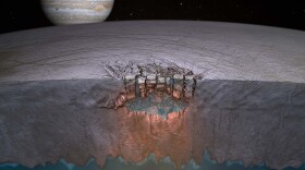 An artist's depiction of the "Great Lake" underneath Europa's icy surface.