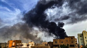 Smoke plumes billow from a fire at a lumber warehouse in southern Khartoum amidst ongoing fighting on June 7, 2023. Eight weeks of fighting have pitted Sudan's army chief Abdel Fattah al-Burhan against his former deputy Mohamed Hamdan Daglo -- commonly known as Hemeti -- who commands the powerful paramilitary Rapid Support Forces (RSF). A number of broken ceasefires have offered brief lulls but no respite for residents of Khartoum, where witnesses again reported "the sound of heavy artillery fire" in the capital's northwest.