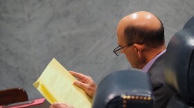 Sen. Gary Byrne, R-Byrneville, reviews paperwork in the Senate chamber on Thursday, Feb. 20, 2025.