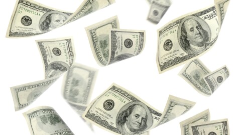Flying money on a white background